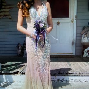 Prom dress size 0 tan/ flesh tone with gold and silver sequins. Worn once .